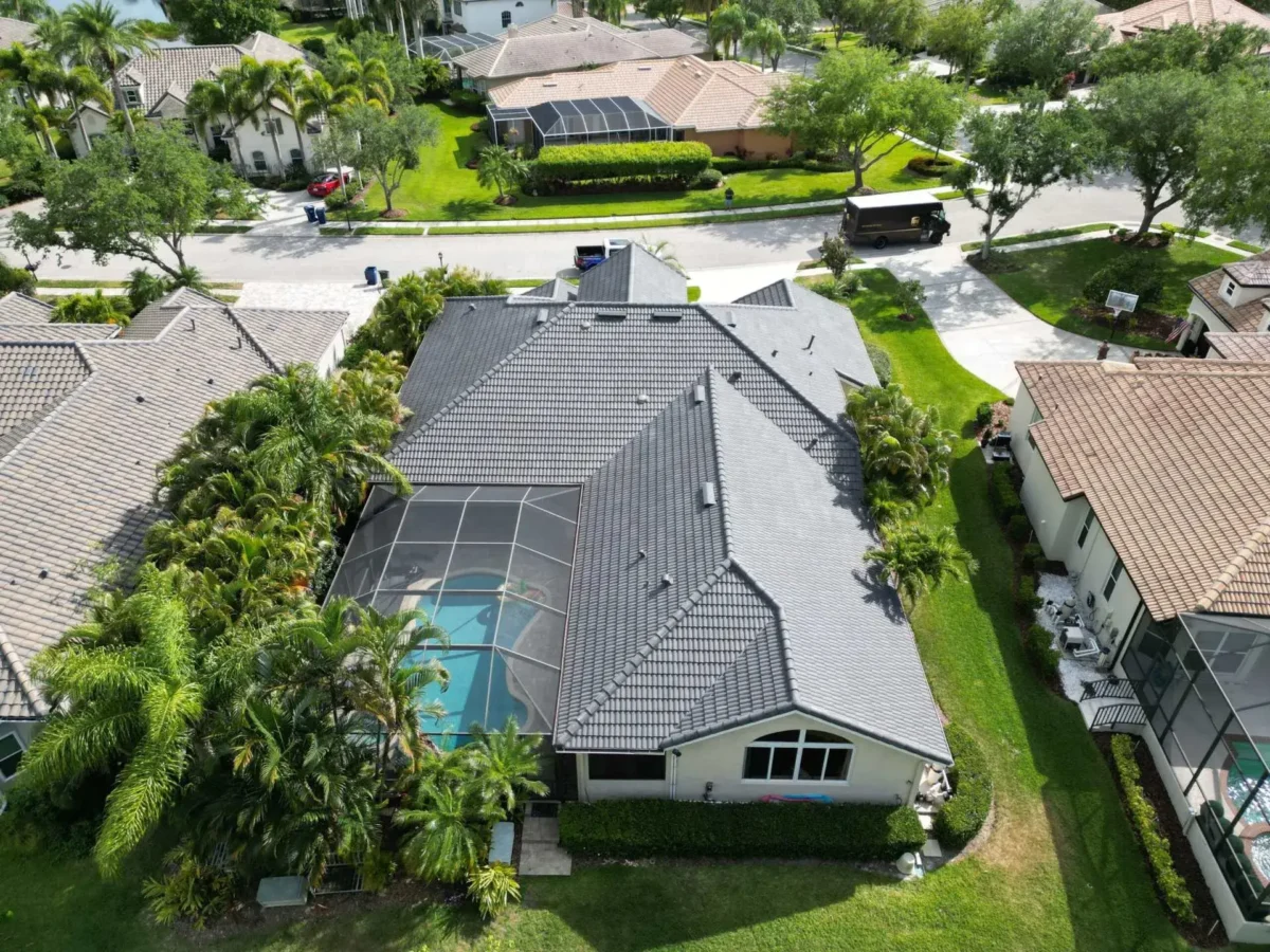 Dark tile roof replacement on a Sarasota, FL home — aerial view 2